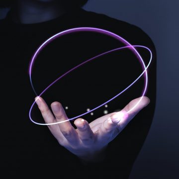 Woman’s hand presenting futuristic technology digital remix